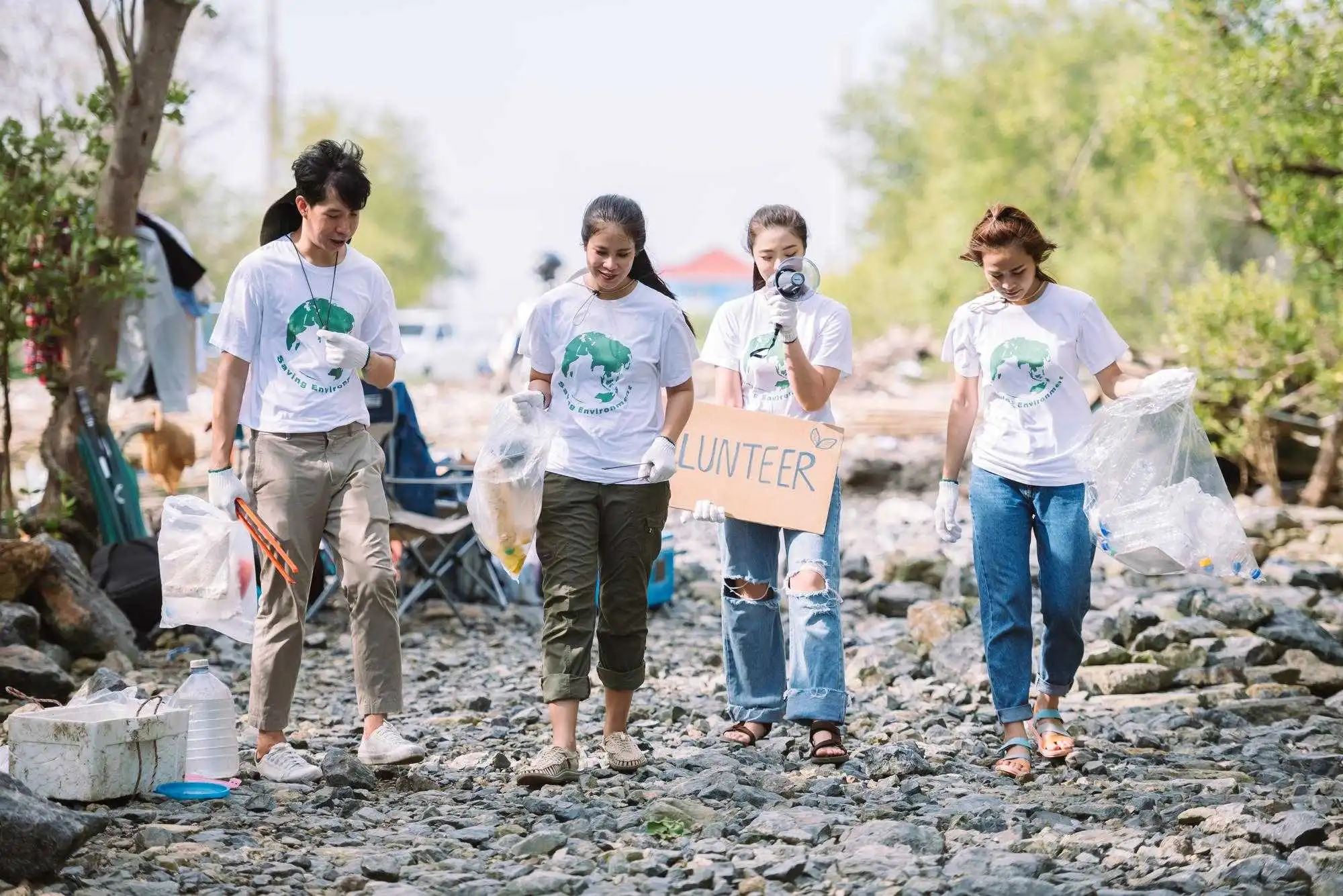 group asian diverse people volunteer teamwork environment conservationvolunteer help picking plastic