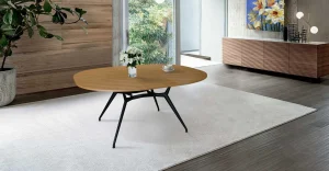 A sleek extendable dining table with a modern design perfect for accommodating extra guests during gatherings