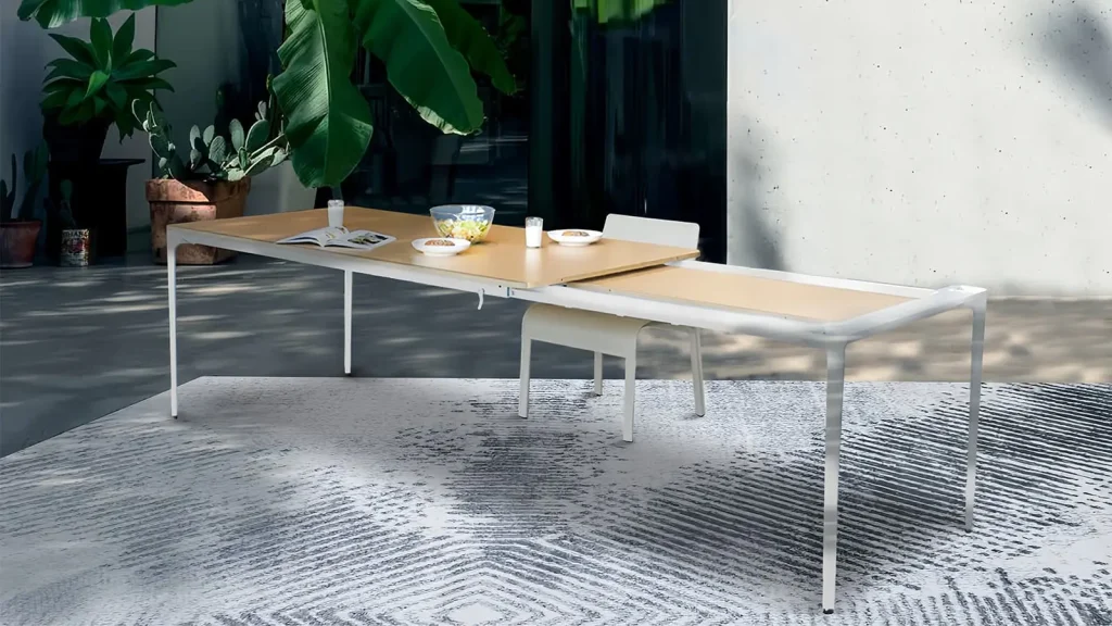 Expandable dining table with white base