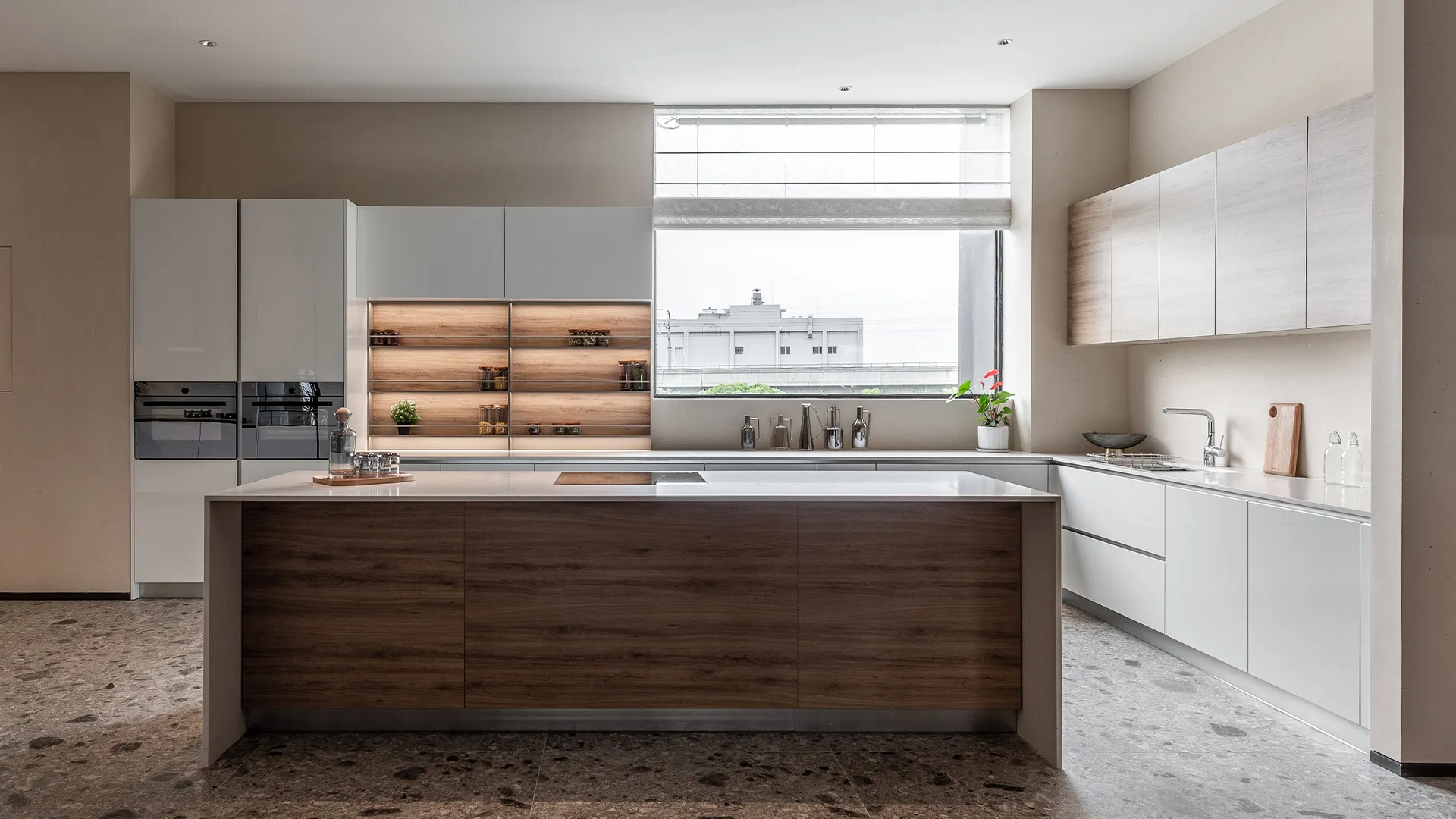 Bright kitchen with wood and white cabinets large window view