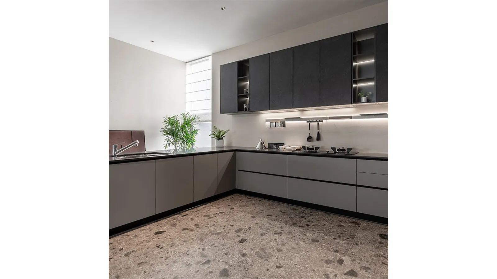 Modern kitchen with L shaped layout and sleek cabinets