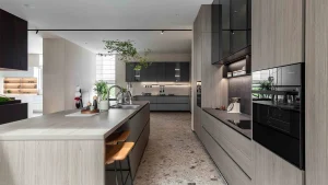 Spacious kitchen with island modern appliances and greenery