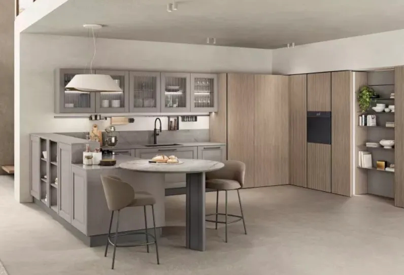 This image features a modern kitchen with a combination of grey cabinetry and light wood finishes