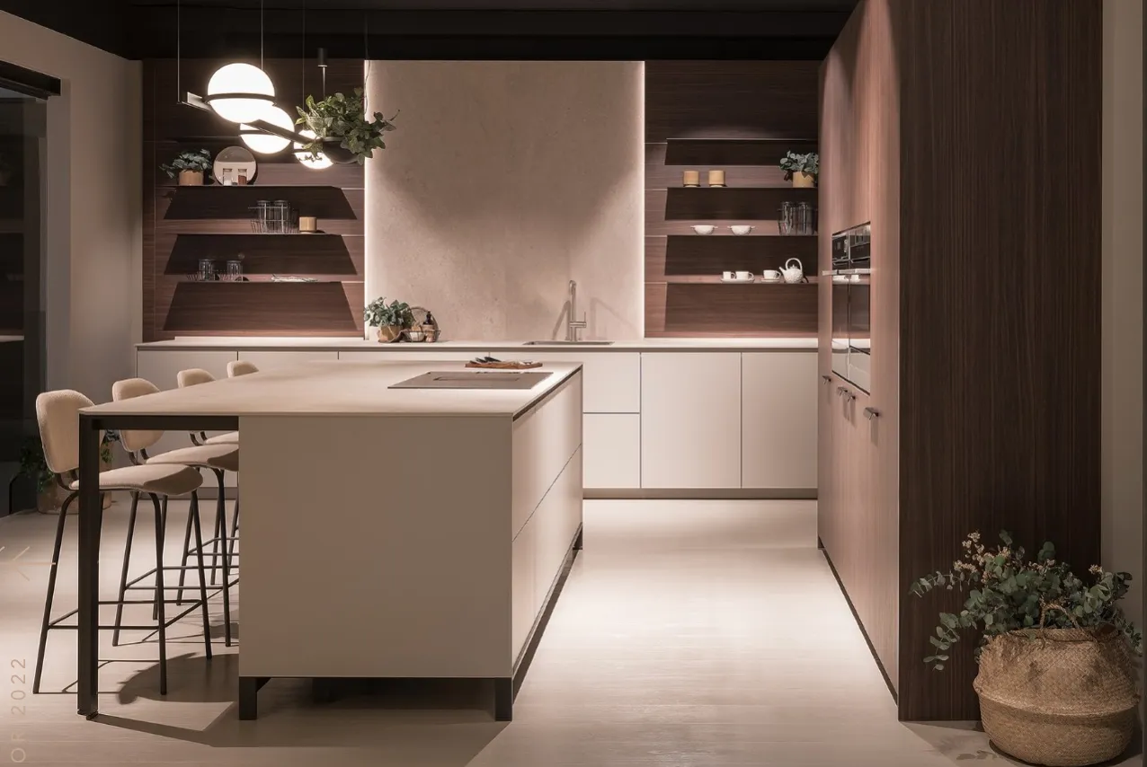 This image features a modern kitchen with a spacious island built in wooden cabinetry and open shelving The lighting design and integrated plants add warmth and style to the space