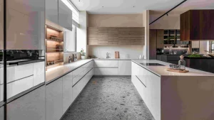 White kitchen with integrated open shelving and light wood cabinets