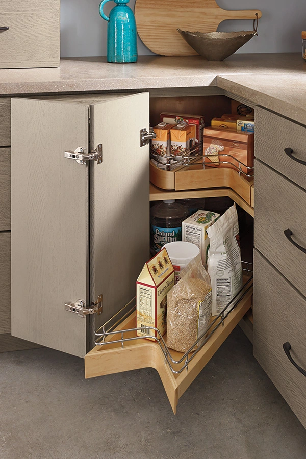 Corner cabinets with Lazy Susans in modern kitchen cabinets for efficient storage Corner cabinets with Lazy Susans in modern kitchen cabinets for efficient storage