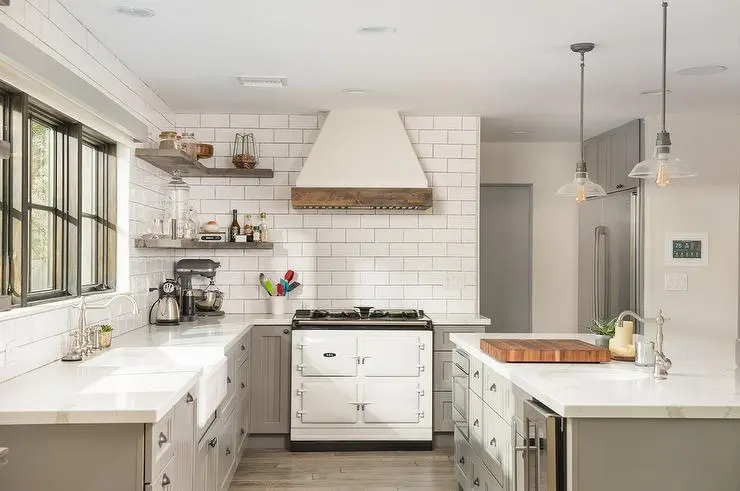 Light taupe kitchen cabinets with white marble countertops and a rustic vibe Light taupe kitchen cabinets with white marble countertops and a rustic vibe
