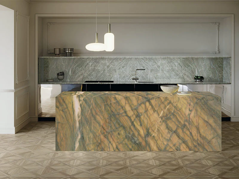 Modern kitchen featuring large island and backsplash with striking natural stone surfaces Modern kitchen featuring large island and backsplash with striking natural stone surfaces