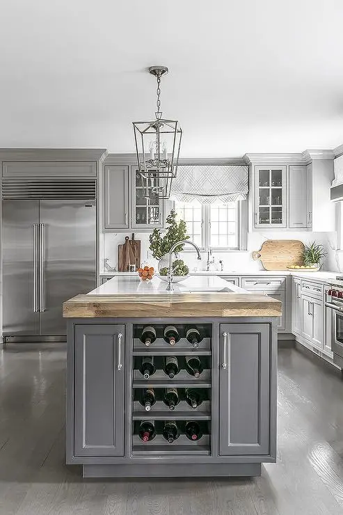Modern kitchen island with built in wine storage and wooden countertop Modern kitchen island with built in wine storage and wooden countertop