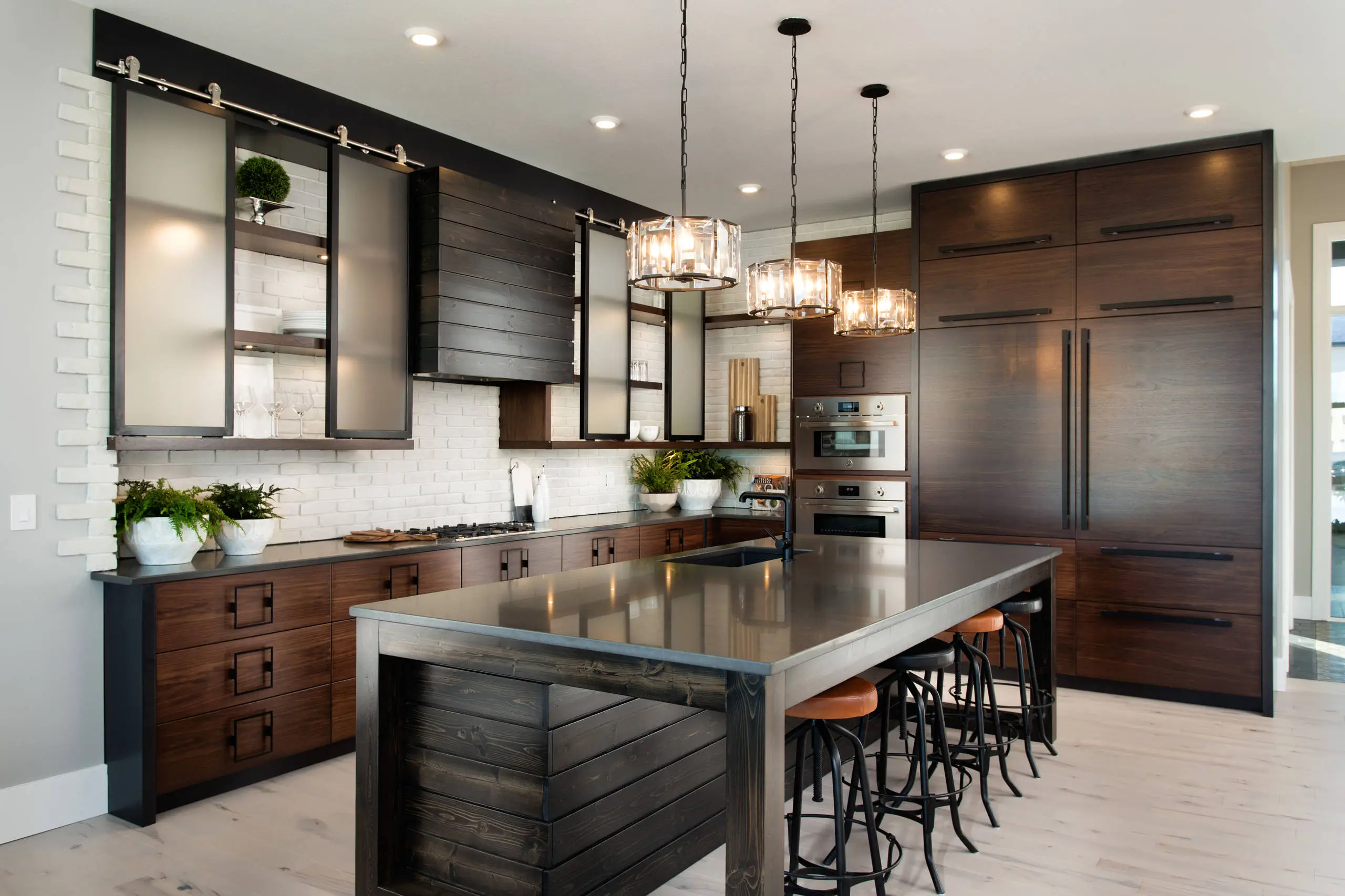 Modern kitchen with glass elements and industrial accents Modern kitchen with glass elements and industrial accents