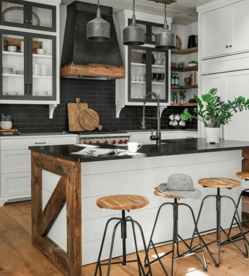 Rustic white kitchen cabinet with wood elements and black countertops Rustic white kitchen cabinet with wood elements and black countertops