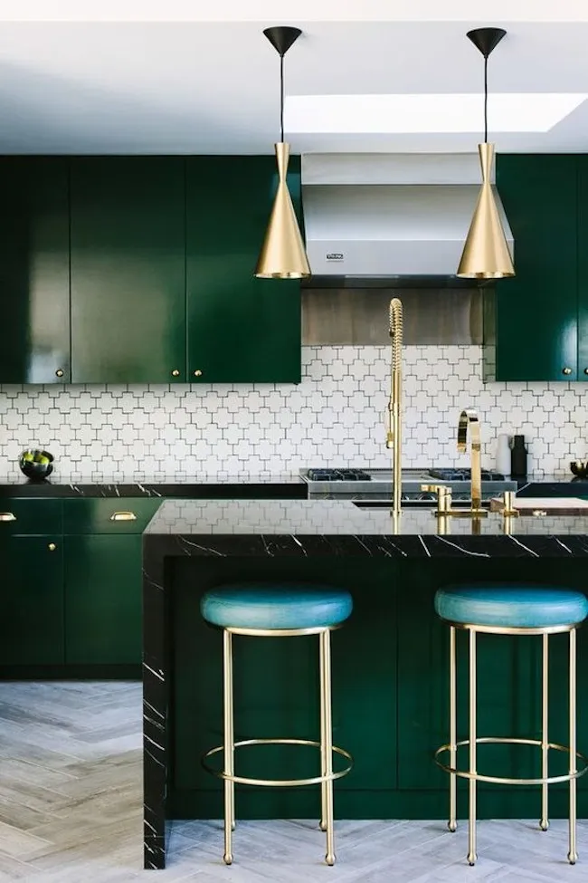 Brass and Gold Finishes Green kitchen with sleek brass pendant lights over the island Brass and Gold Finishes Green kitchen with sleek brass pendant lights over the island