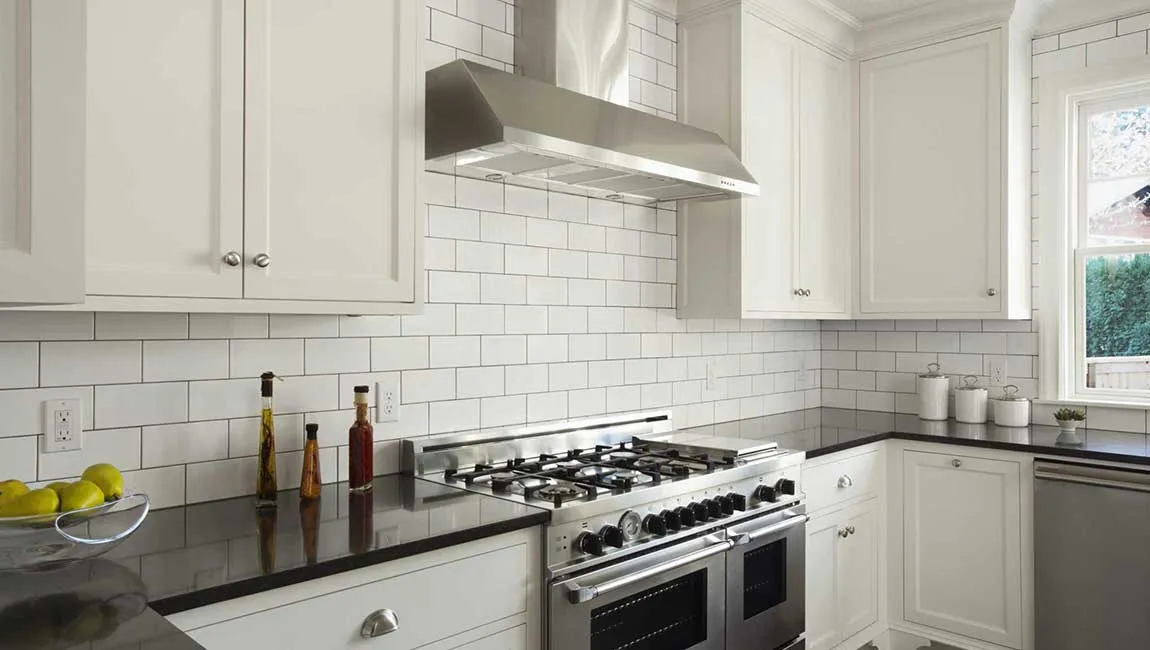 Modern kitchen with classic subway tile backsplash layout Modern kitchen with classic subway tile backsplash layout