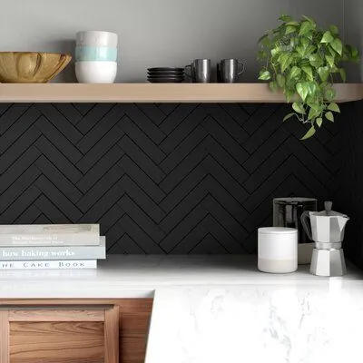 Modern kitchen with matte black herringbone tile backsplash Modern kitchen with matte black herringbone tile backsplash