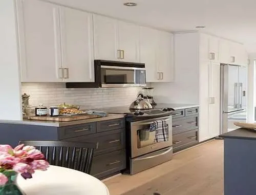 Slate lower cabinets with off white uppers