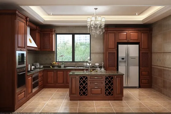 Antique kitchen with wooden cabinets and central island Antique kitchen with wooden cabinets and central island
