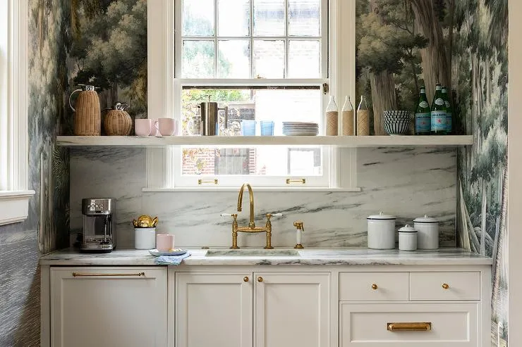 Classic white kitchen with brass fixtures and natural lighting Classic white kitchen with brass fixtures and natural lighting