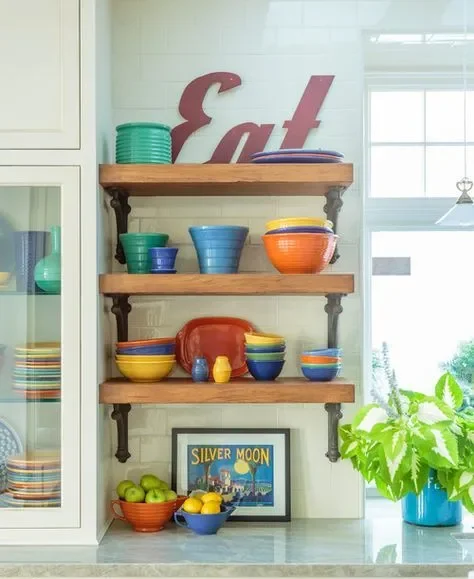Colorful kitchen shelves displaying bright dishes and decor Colorful kitchen shelves displaying bright dishes and decor
