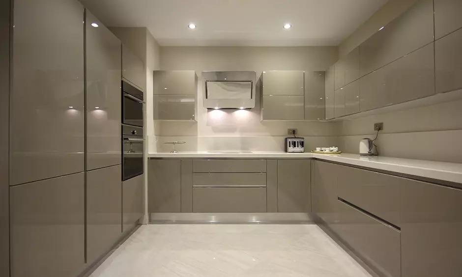 Modern glossy grey kitchen with under cabinet lighting Modern glossy grey kitchen with under cabinet lighting