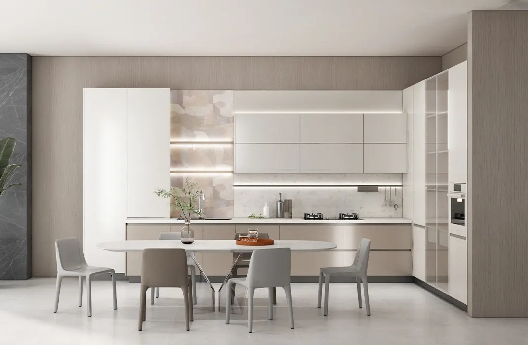 Modern kitchen with sleek white cabinets and a chic dining setup