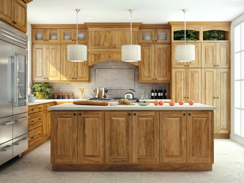 Natural wood kitchen cabinets with a central island Natural wood kitchen cabinets with a central island