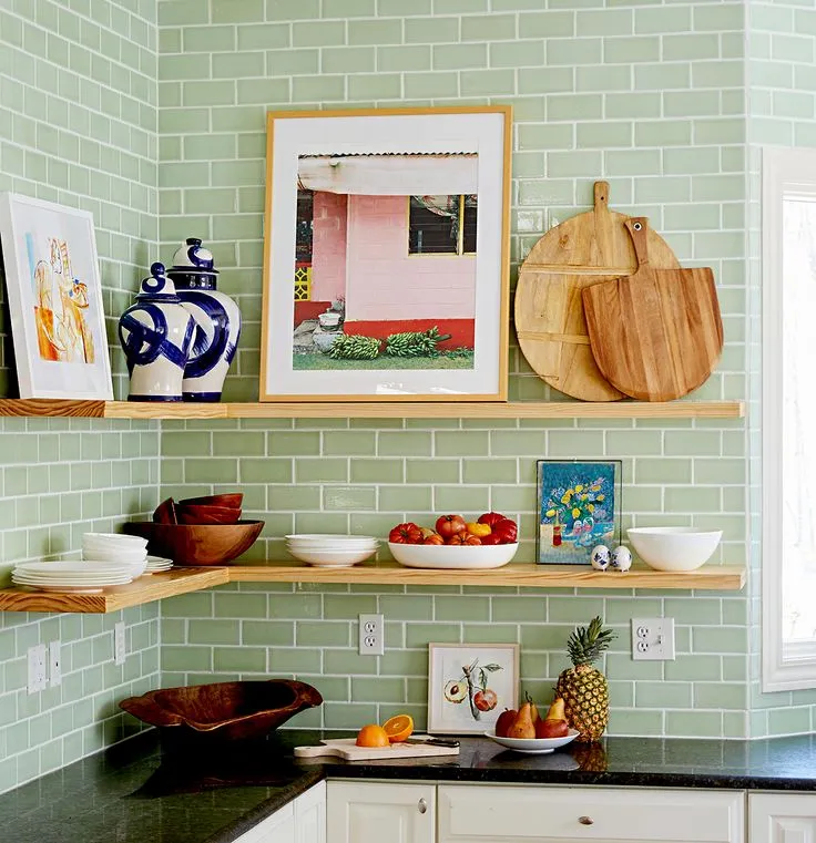 Open kitchen shelves displaying wooden boards and fruit bowls Open kitchen shelves displaying wooden boards and fruit bowls