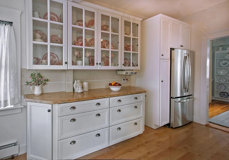 White kitchen cabinets with glass doors and granite countertop White kitchen cabinets with glass doors and granite countertop