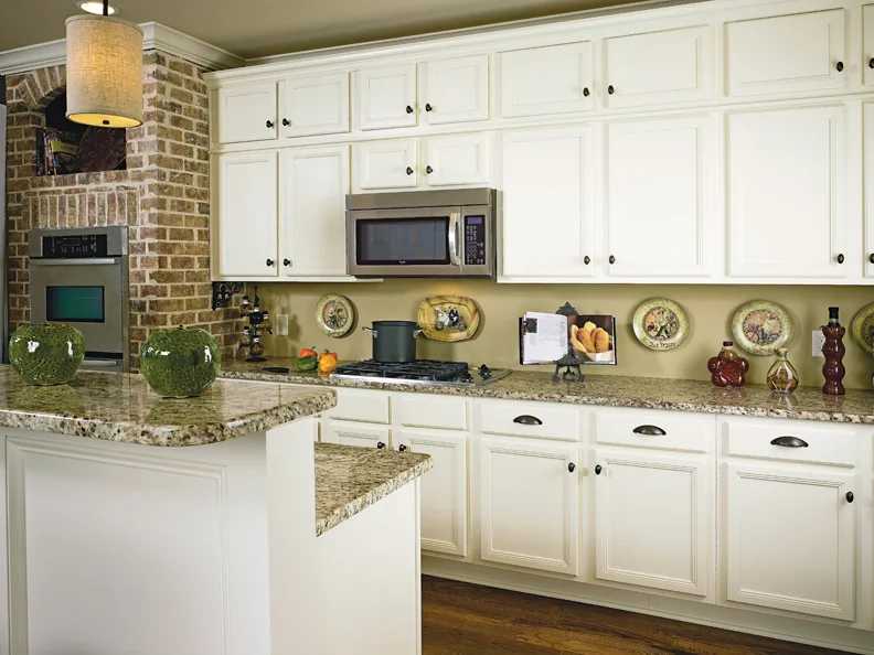 White vintage style kitchen cabinets and granite countertops White vintage style kitchen cabinets and granite countertops
