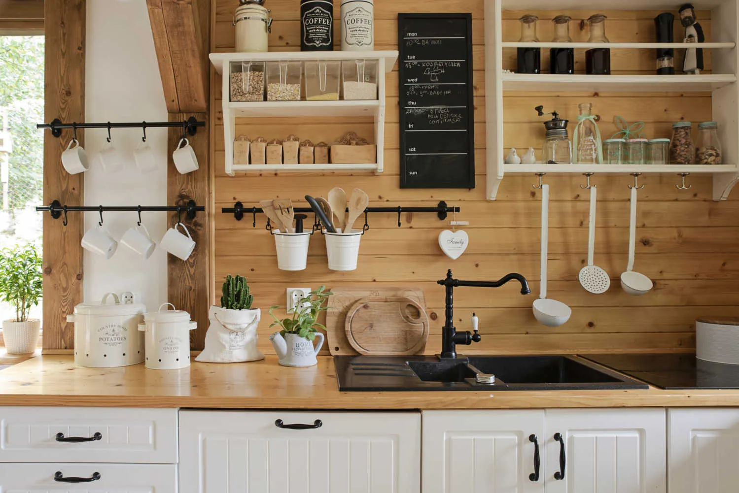 open kitchen cabinets with cultery