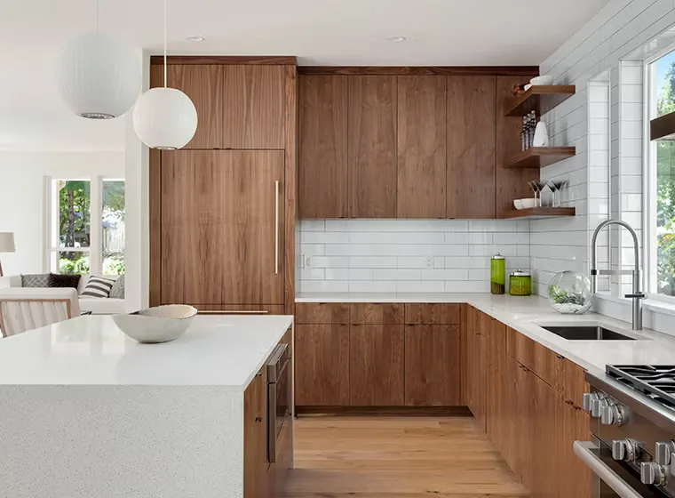 Classic kitchen with brown wood cabinets and white accents Classic kitchen with brown wood cabinets and white accents
