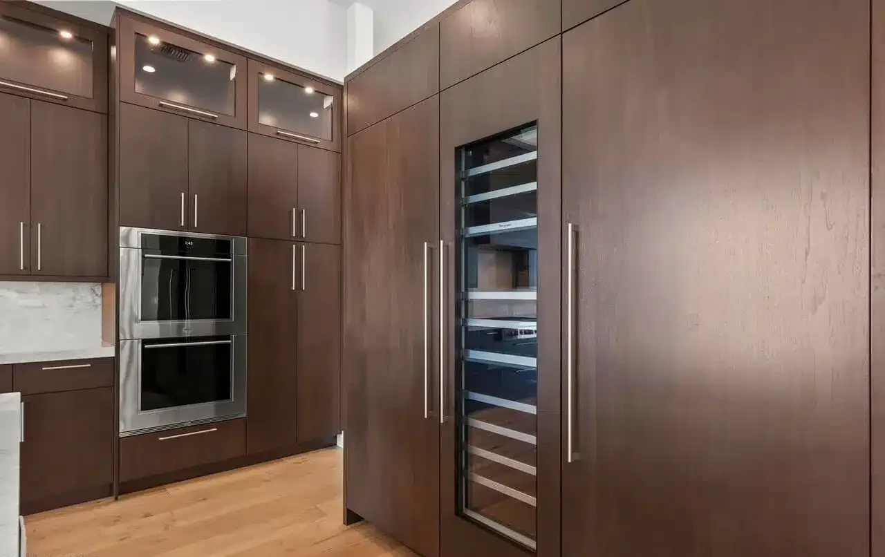 brown kitchen cabinet with gloss hook Minimalist brown and beige kitchen with large glass windows