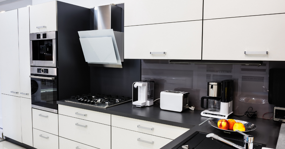 Black cabinets and marble countertops with an elegant backsplash Modern Black and White Cabinets Countertop Materials