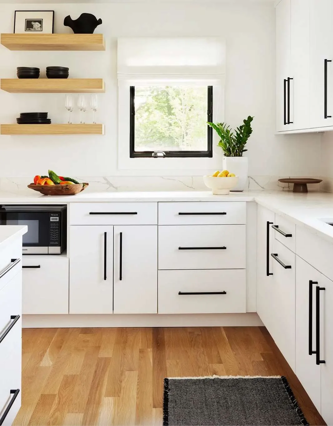 White cabinets with open shelves and black countertop Modern Black and White Cabinets Open Shelvings