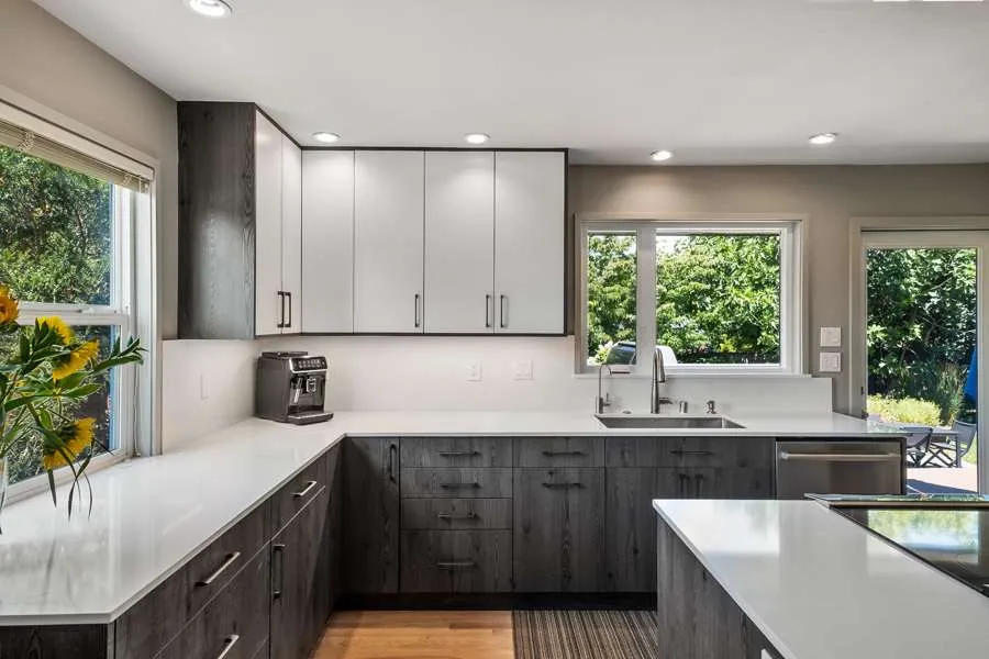 Sleek modern gray kitchen cabinets with clean lines Sleek modern gray kitchen cabinets with clean lines