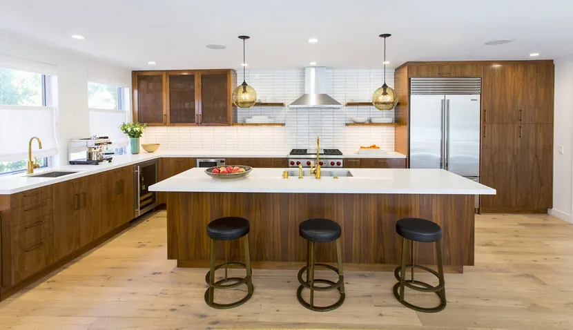 brown kitchen cabinet with pendant lighting over the island modern Brown Kitchen Cabinets Use Pendant Lighting Over the Island