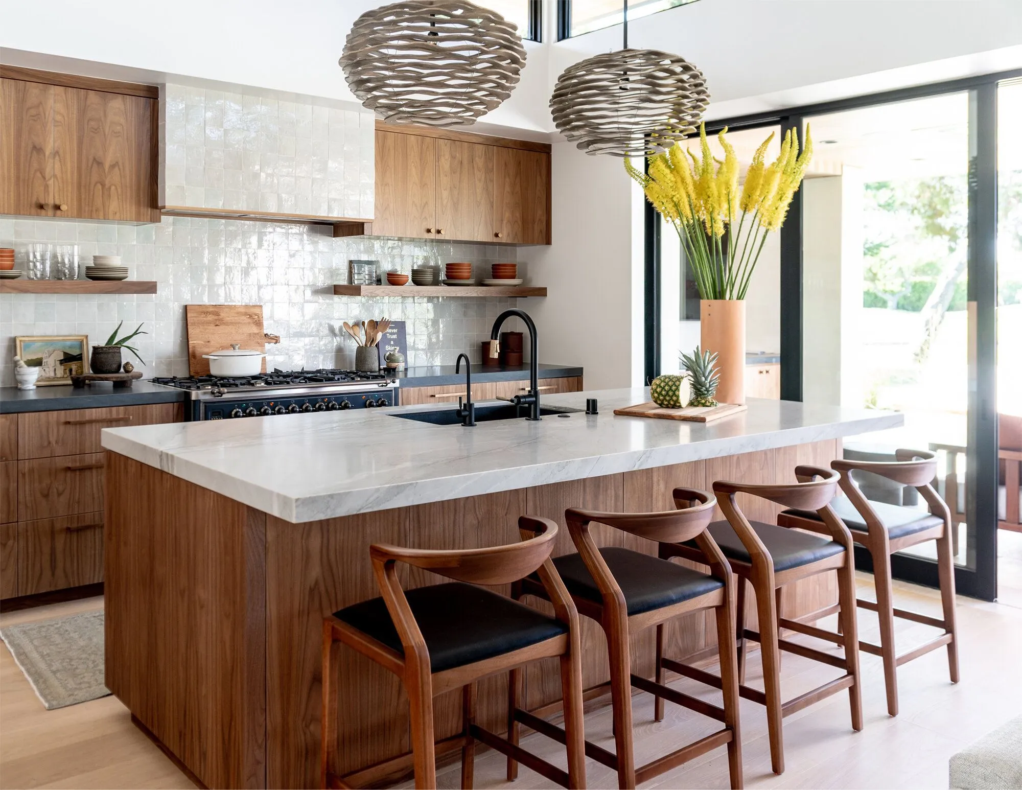 brown kitchen cabinets with sculptural chandeliers modern Brown Kitchen Cabinets Use Sculptural Chandeliers