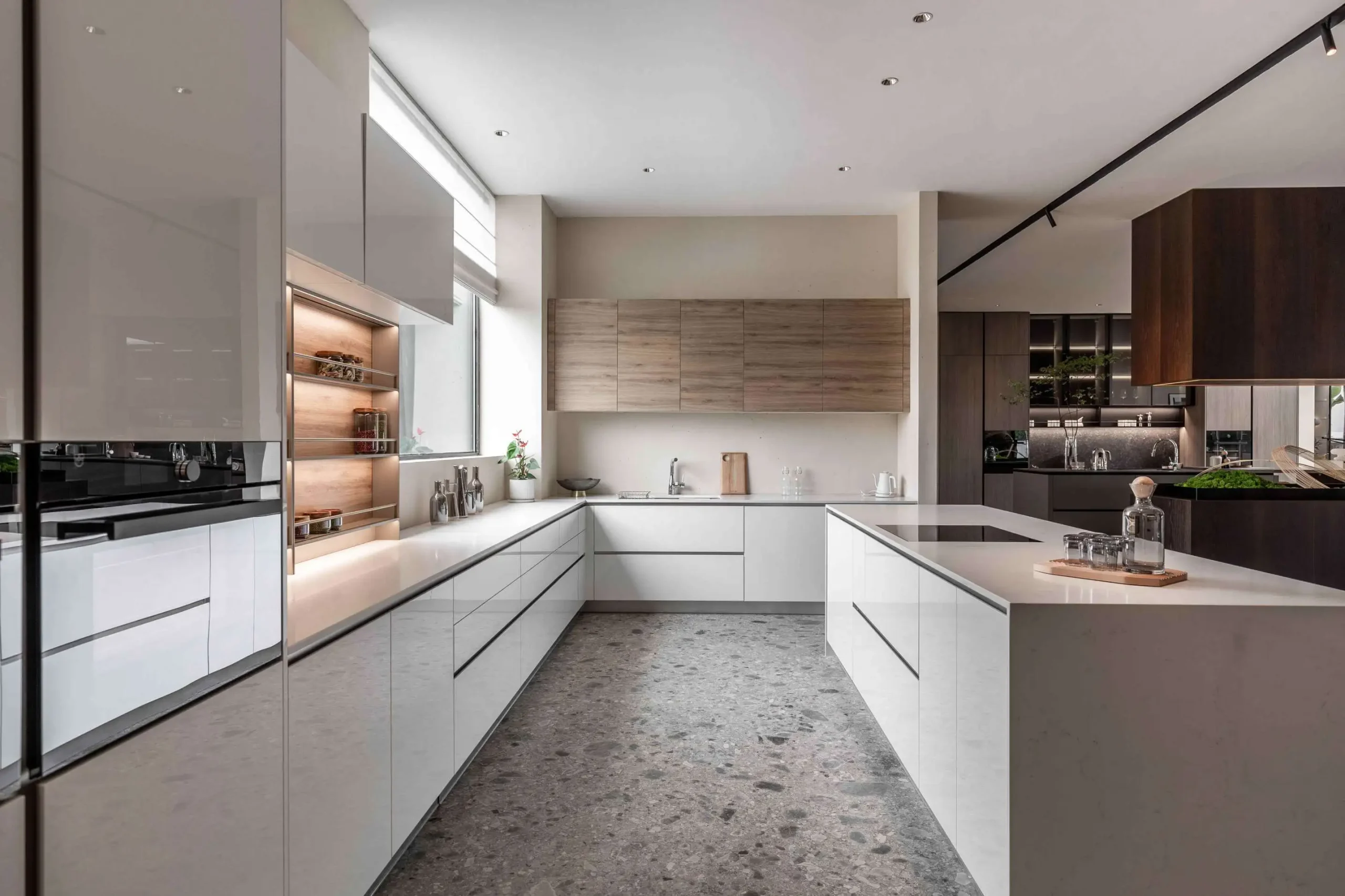 Greige contemporary kitchen with black countertops and stainless steel appliances modern Greige Kitchen Cabinets Contemporary Kitchens with Black Countertops