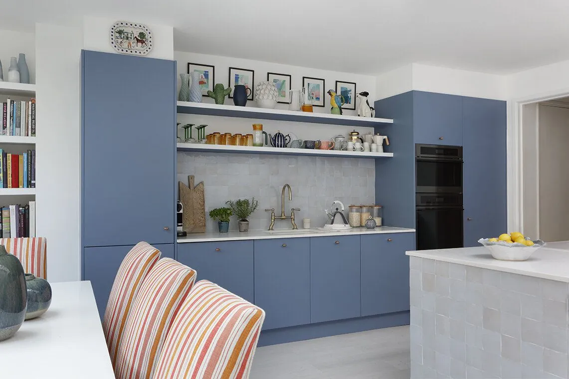 Blue kitchen cabinets with open wooden shelves and white walls modern blue Kitchen Cabinets Blue Cabinets with Open Shelving