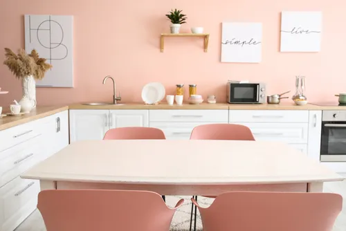 Traditional wood kitchen cabinets with beige walls and pendant lights wood kitchen cabient Pale Peach wall