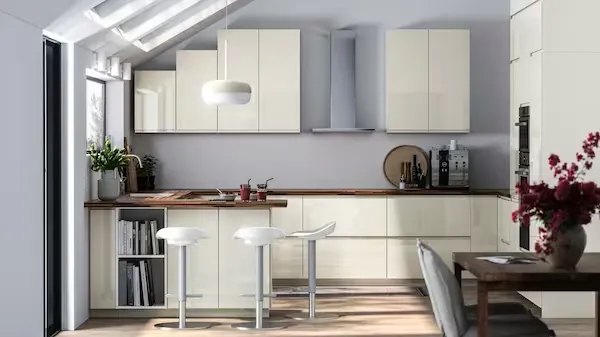 Spacious kitchen with wood cabinets and beige walls featuring island wood kitchen cabinet with Warm Taupe wall