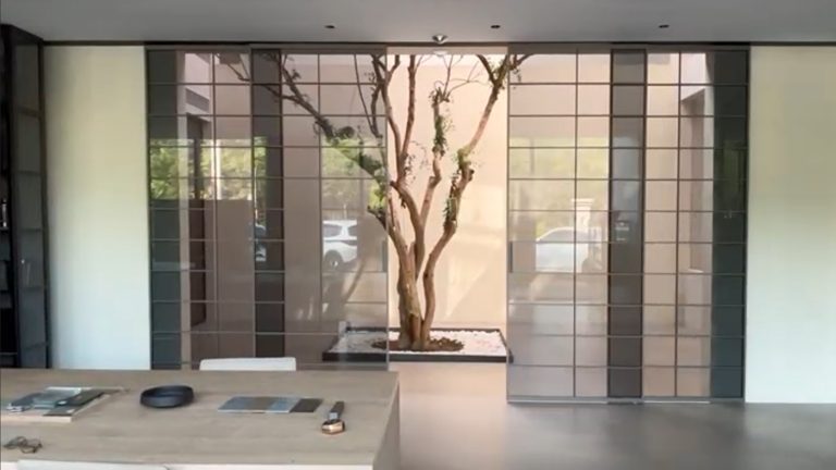 Glass sliding door for global designer