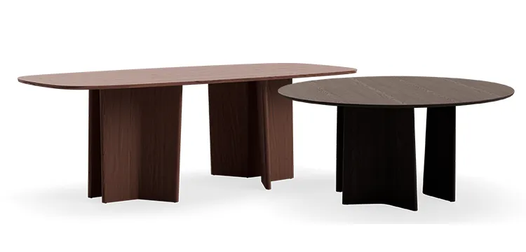 King Living dining tables in oval and round shapes with wood finish