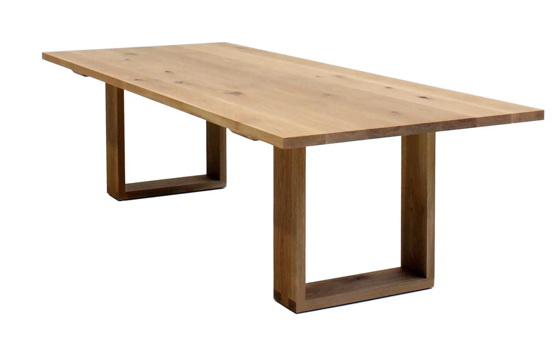 Mark Tuckey dining table with a rectangular wooden top and box legs