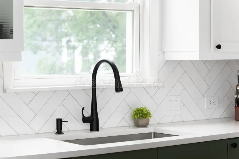 modern White kitchen cabinets with black hardware Herringbone Detail