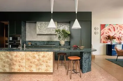 Add a Bold Kitchen Island Dark green kitchen with crystal chandelier modern green kitchens with dark cabinets Add a Bold Kitchen Island