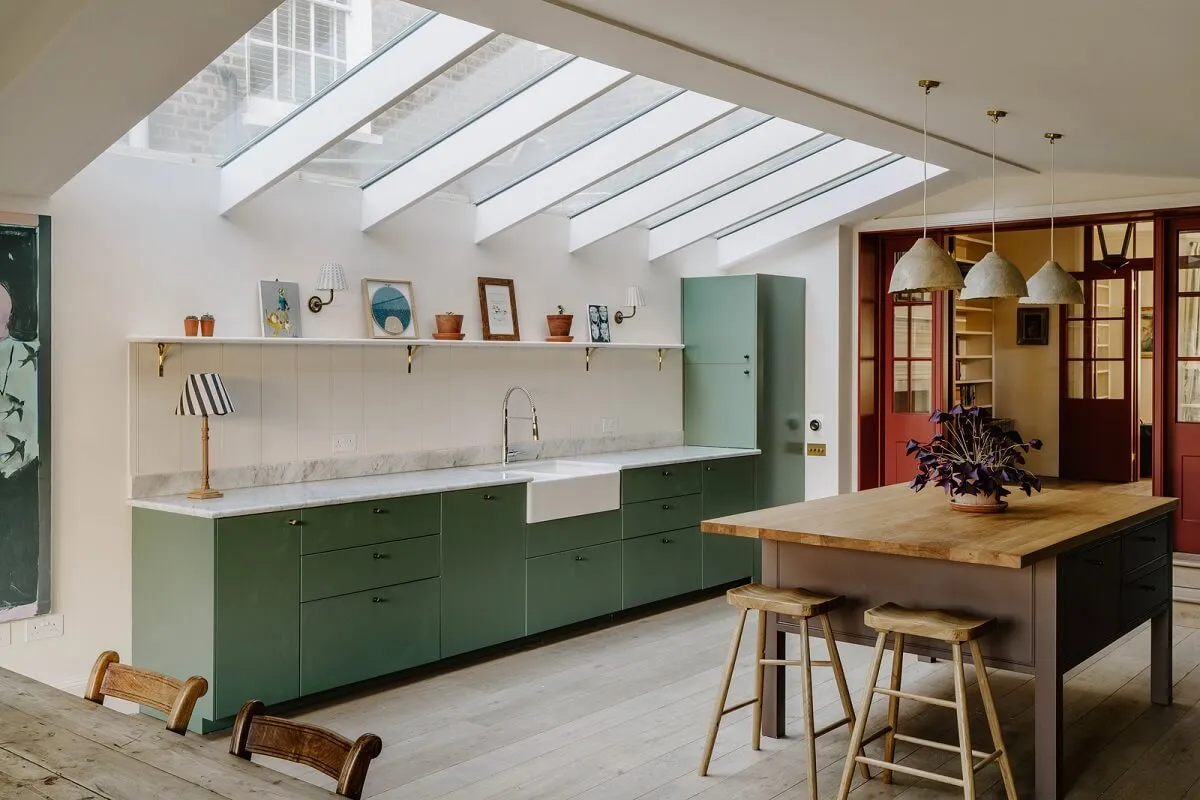 Introduce a Skylight Green kitchen with skylight and pink ceiling details modern green kitchens with dark cabinets Introduce a Skylight