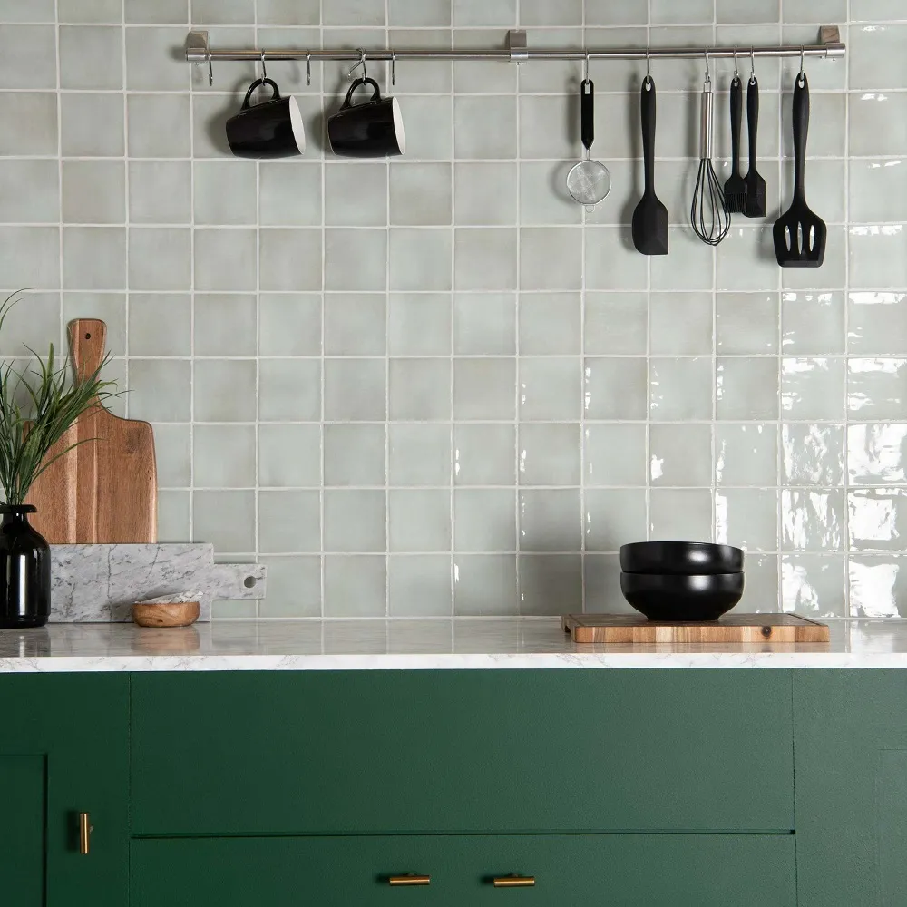 Mixed Metals Farmhouse sink with green cabinets and gold accents for a stylish finish modern green kitchens with dark cabinets Mixed Metals