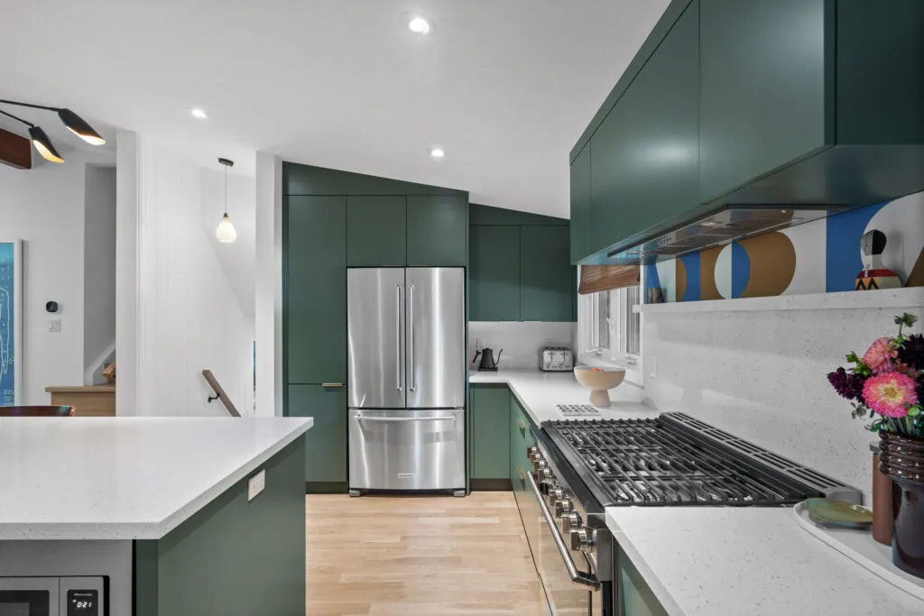 Opt for Retro Appliances Dark green kitchen with brass fixtures and rug modern green kitchens with dark cabinets Opt for Retro Appliances