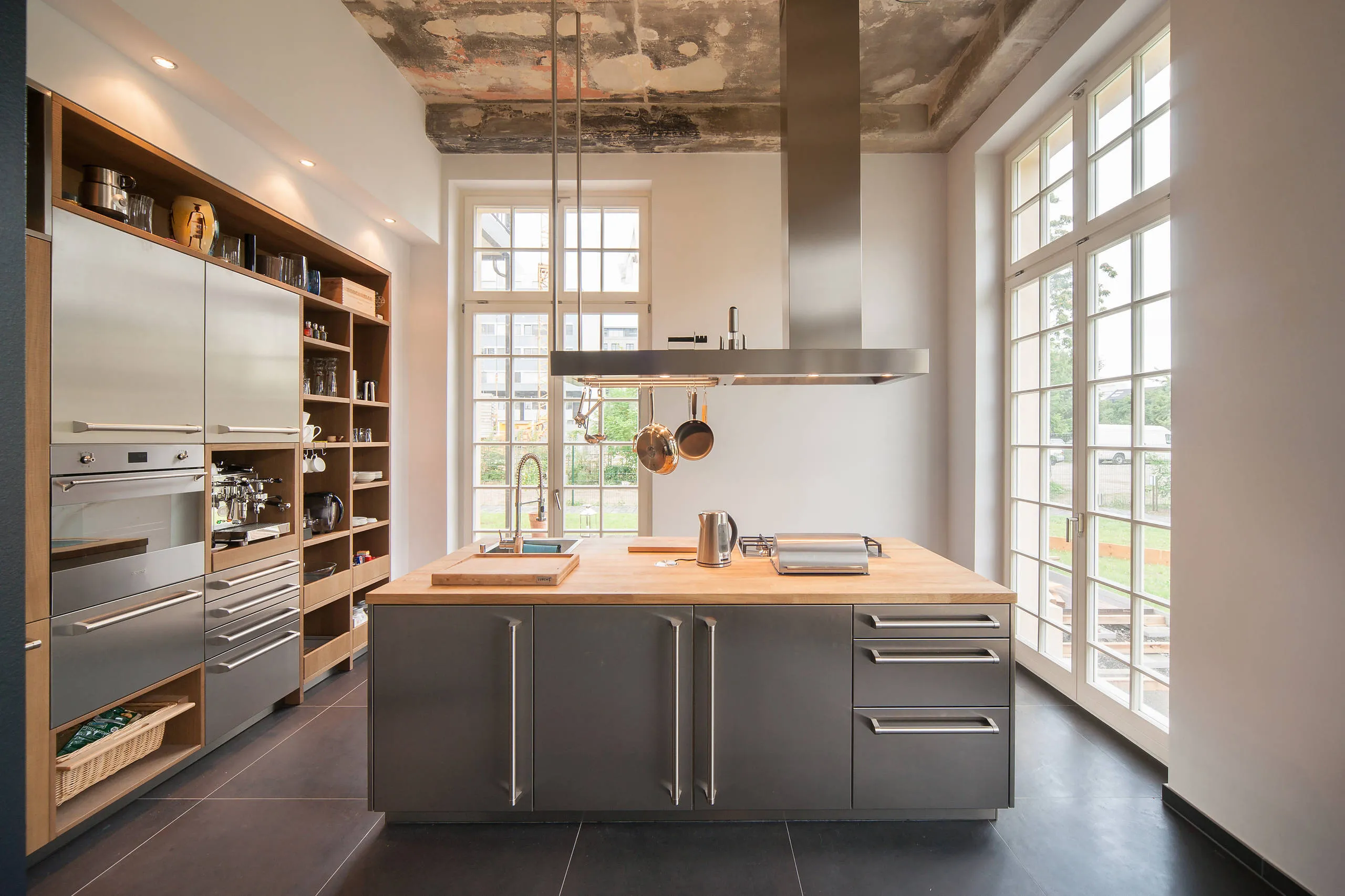 Minimalist kitchen idea Metallic Touches