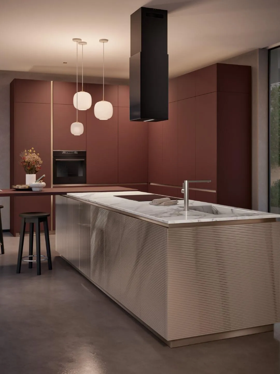 Sophisticated maroon kitchen with marble island and lighting
